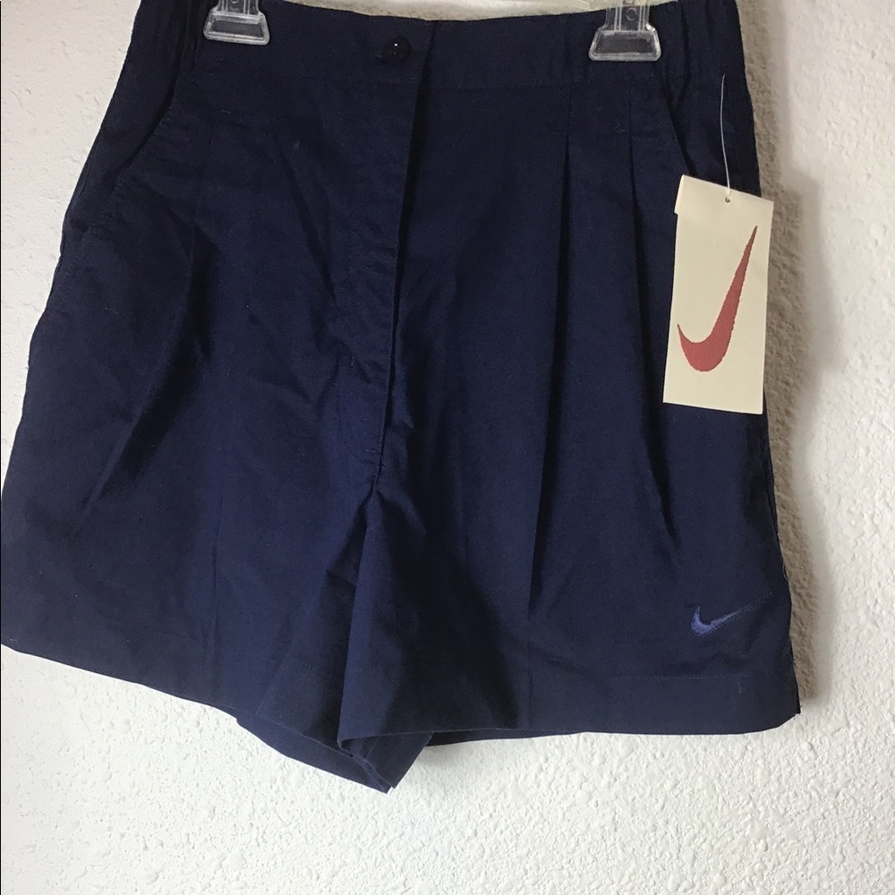Nike vintage navy blue pleated shorts size (8-10)